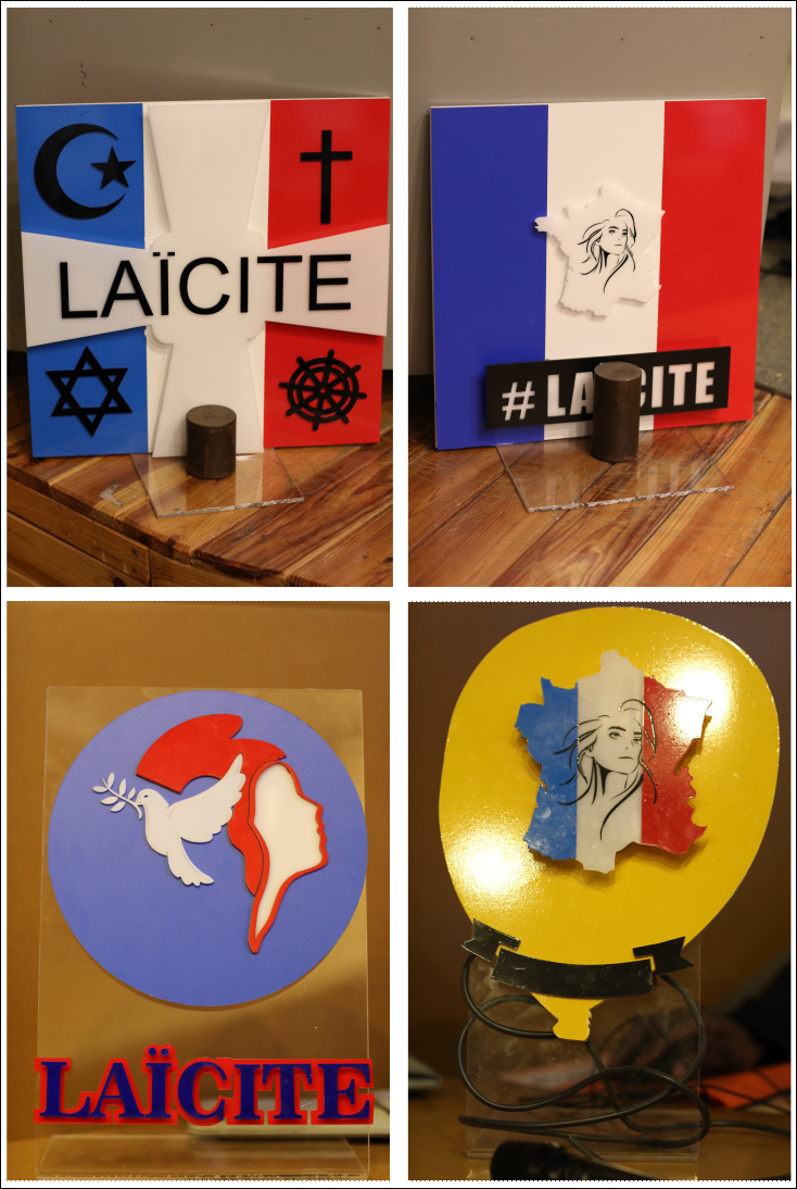 Objets lumineux formés de drapeaux tricolores ou de carte de France ou de Marianne avec des symboles religieux et le mot Laïcité